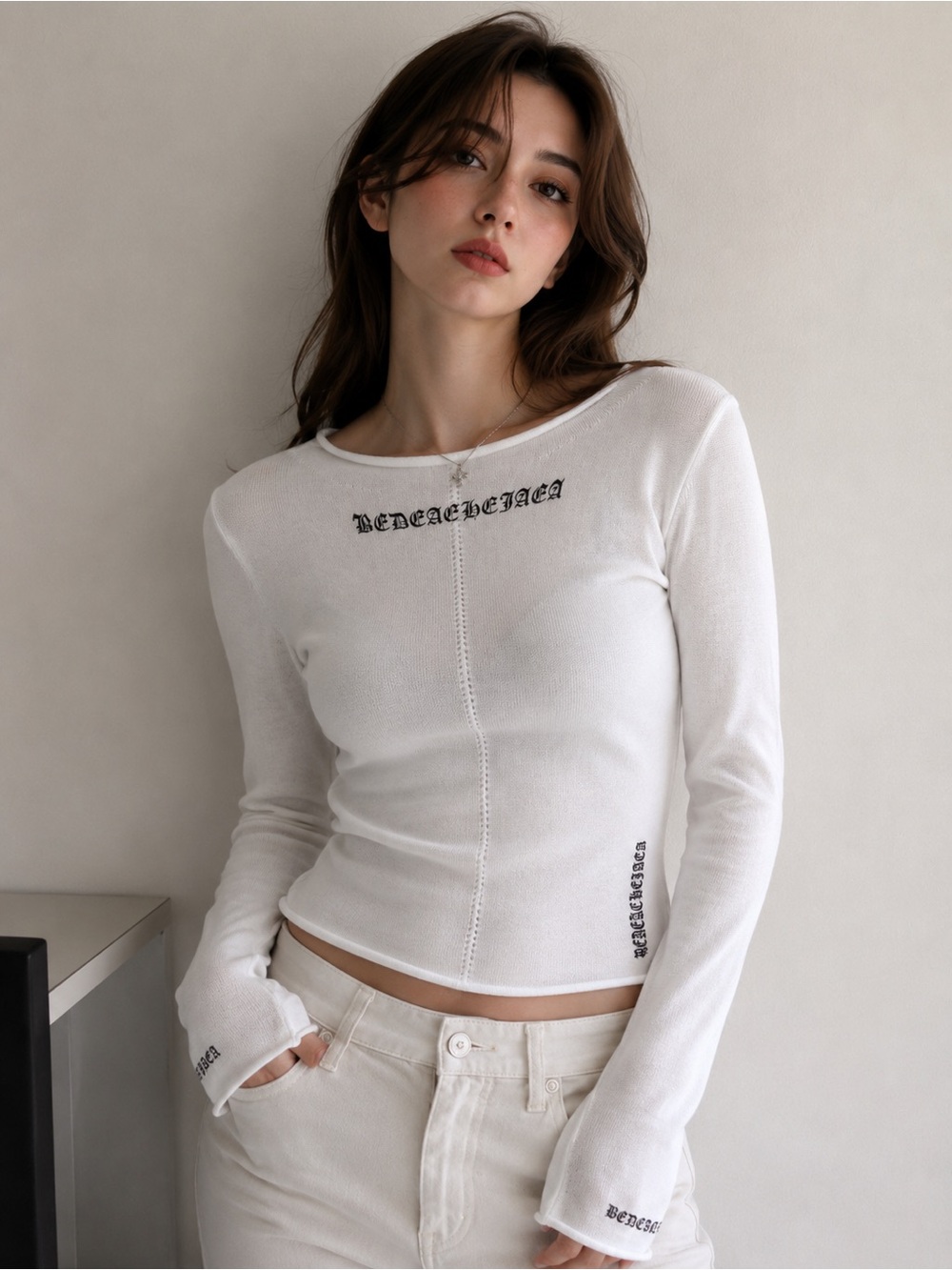 White Long-Sleeve Knit Top with Script Details